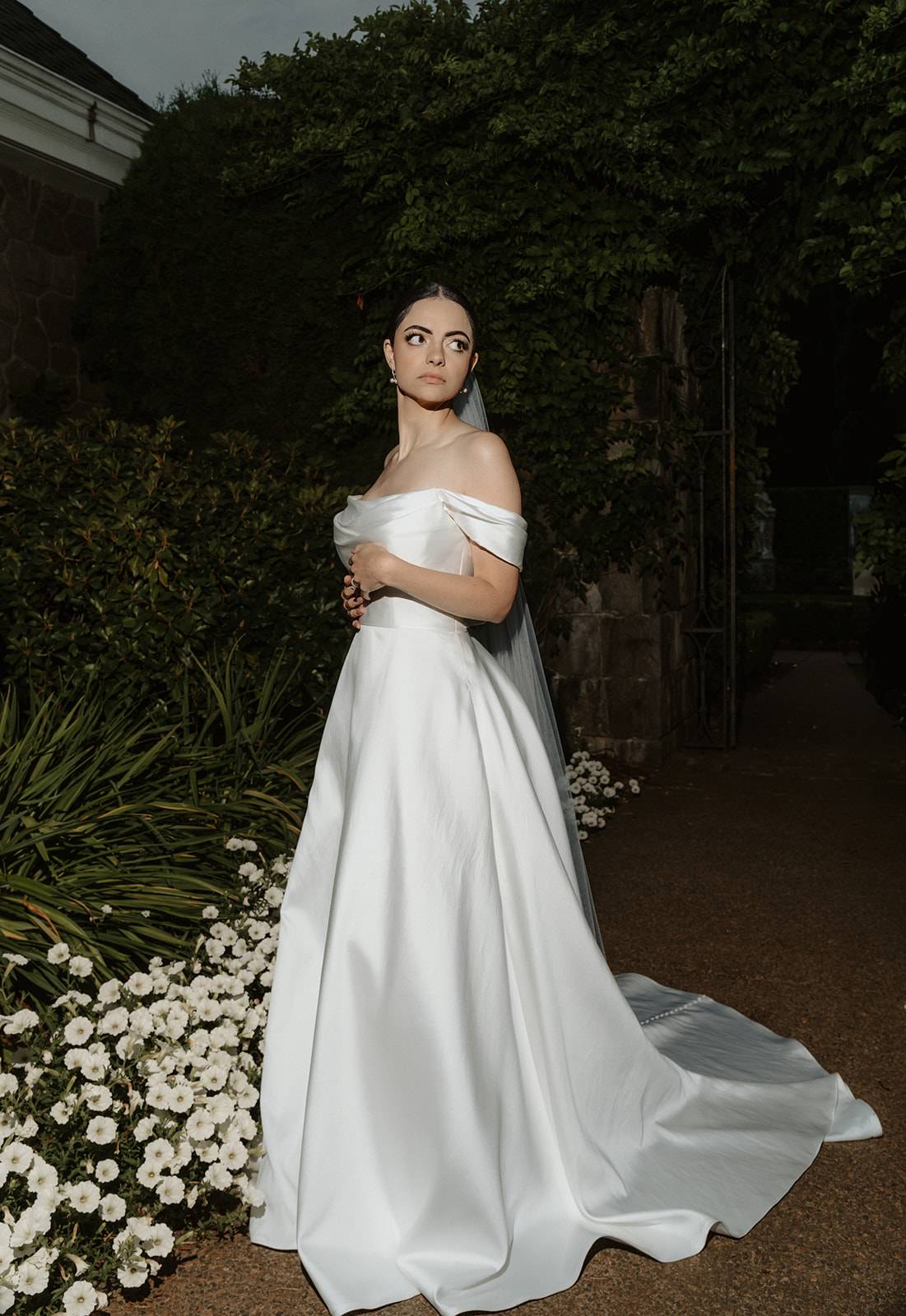 Bride posing in wedding dress