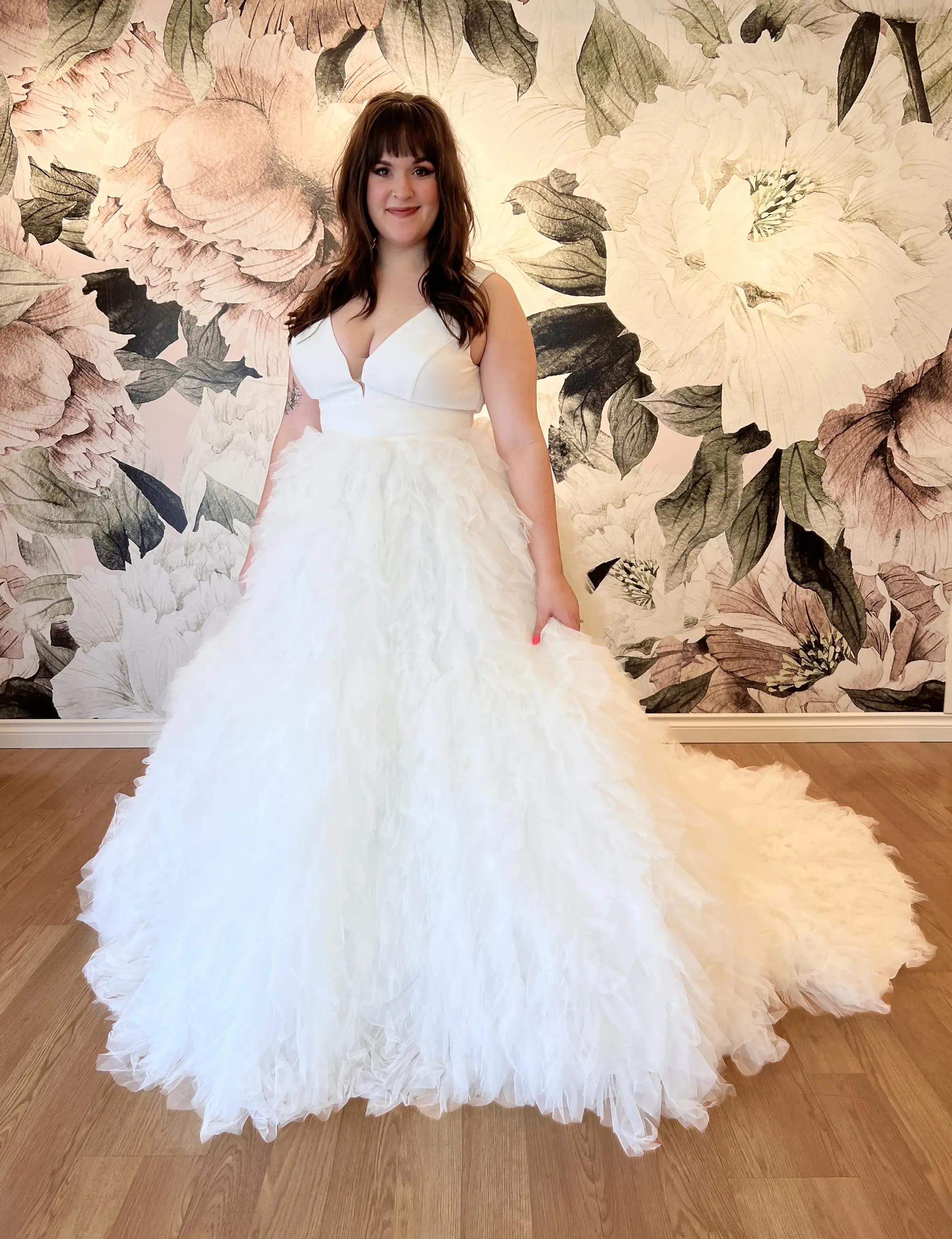 Ruffle Skirt Ball Gown Wedding Dress with V-neckline and Dramatic Train