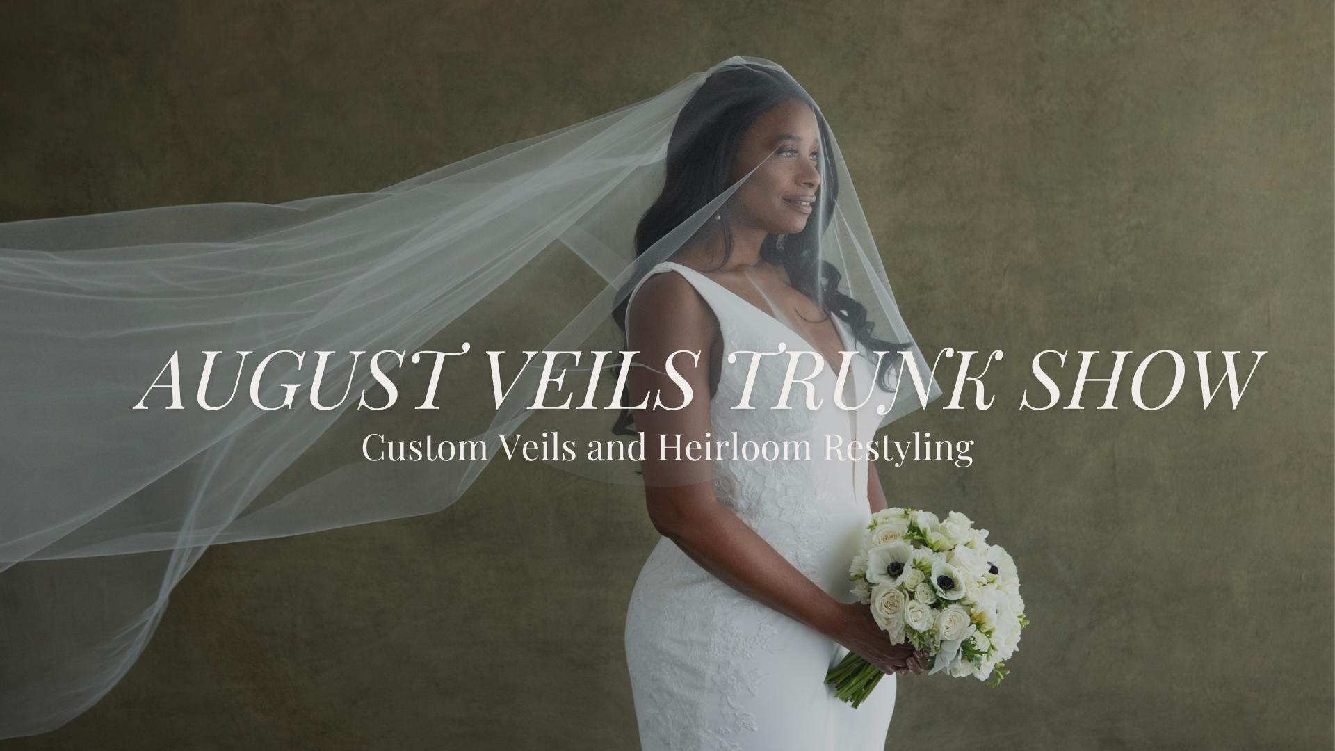 Bride wearing a long tulle veil